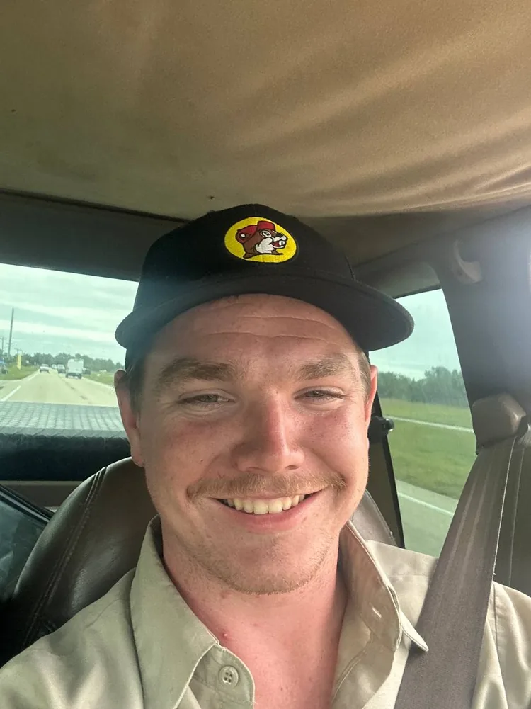 Connor Gaillardetz, owner and lead technician of P&C Mobile Repair, in the cab of the service truck