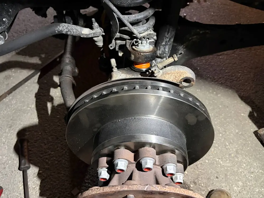 Trailer suspension and brake assembly during an on-site repair