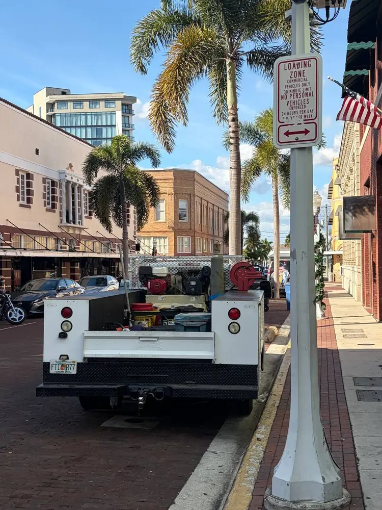P&C Mobile Repair service truck on a downtown Fort Myers street
