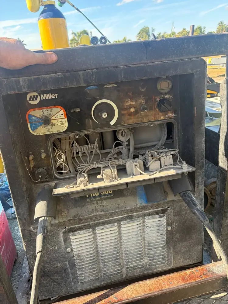 Miller Pro 300 welding generator opened up for an on-site repair